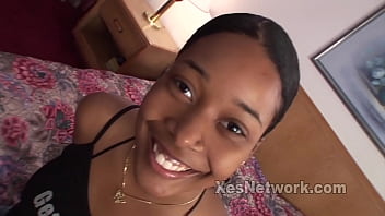 Amateur black teen gives a blowjob and facial in a video